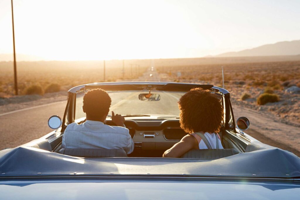 Couple sitting together in a car